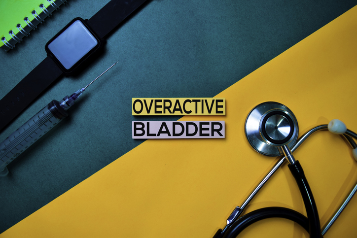 Overactive Bladder text on top view color table and Healthcare/medical concept.