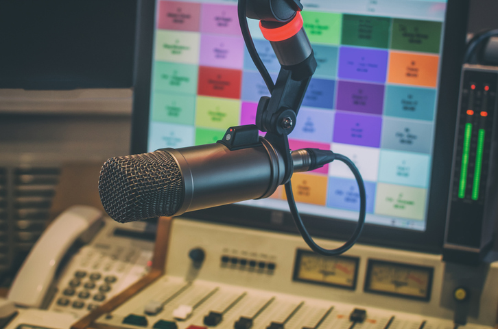 Microphone and audio mixer in the radio studio.