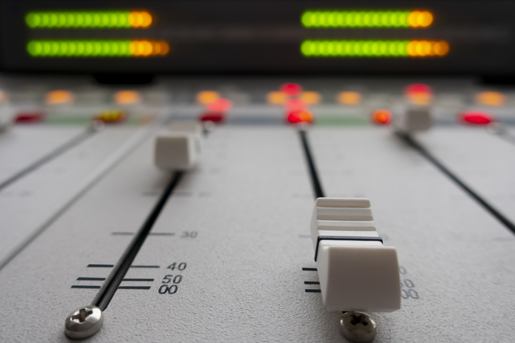 sound mixer in radio studio.