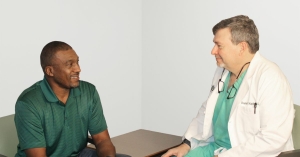 Dr. Kaplan and male patient at a Men’s Health Clinic