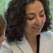 Dr. Taghechian with a patient