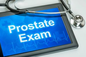 A sign on an iPad that says prostate exam, Benign Prostatic Hyperplasia.