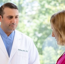 Dr. Hiffa speaking with female patient