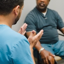 Dr. Kapadia discussing Peyronie's Disease with a patient