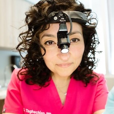 Dr. Taghechian looking into a camera
