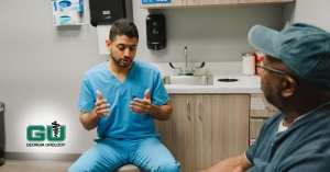 Dr. Kapadia discussing urologic condition with patient and explaining using hands