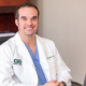 Dr. Bryce Wyatt smiling in his office.