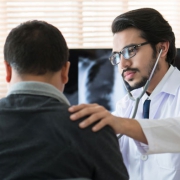 Doctor giving support to patient