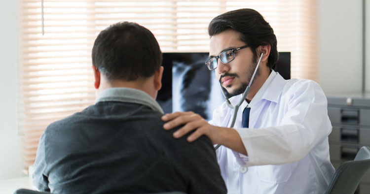 Doctor giving support to patient