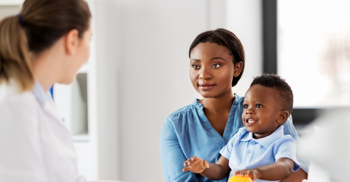 Mother and baby son and doctor at clinic