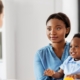 Mother and baby son and doctor at clinic