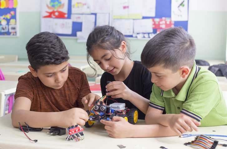 turkish student group are developing the robot in the classrom.