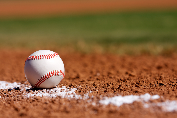 Baseball on the Chalk Line of the Infield.