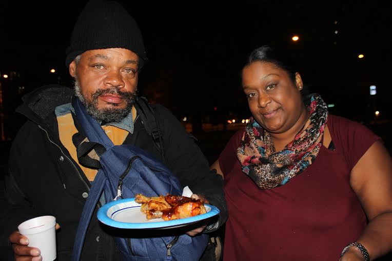 Two people at the Food for Faith event.